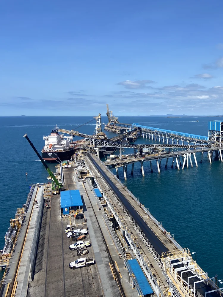 Aerial view of ship loading operations at a Queensland coal terminal